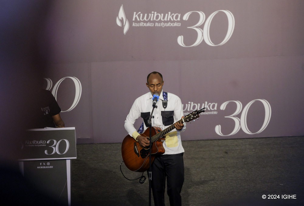 Artist Musinga performing at the event.