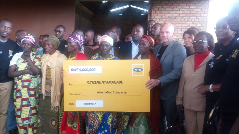 MTN Rwanda handing donations to genocide survivors in Maryohe village.