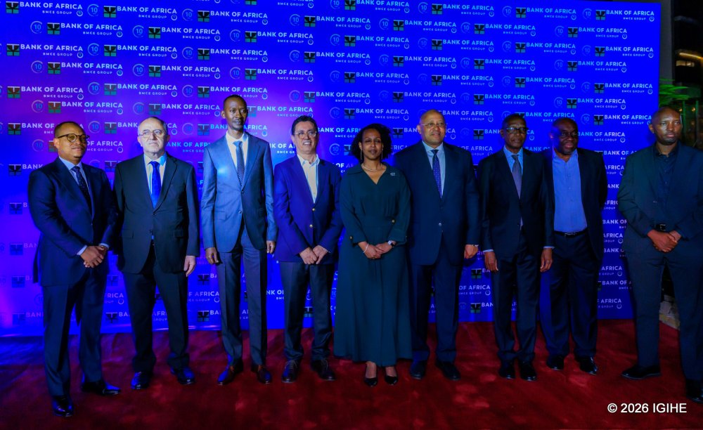 The management and guests in a group photo at the unveiling of new headquarters.
