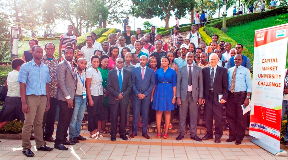 Officials and students pose for a group photo as Capital Market University Challenge kicked off.