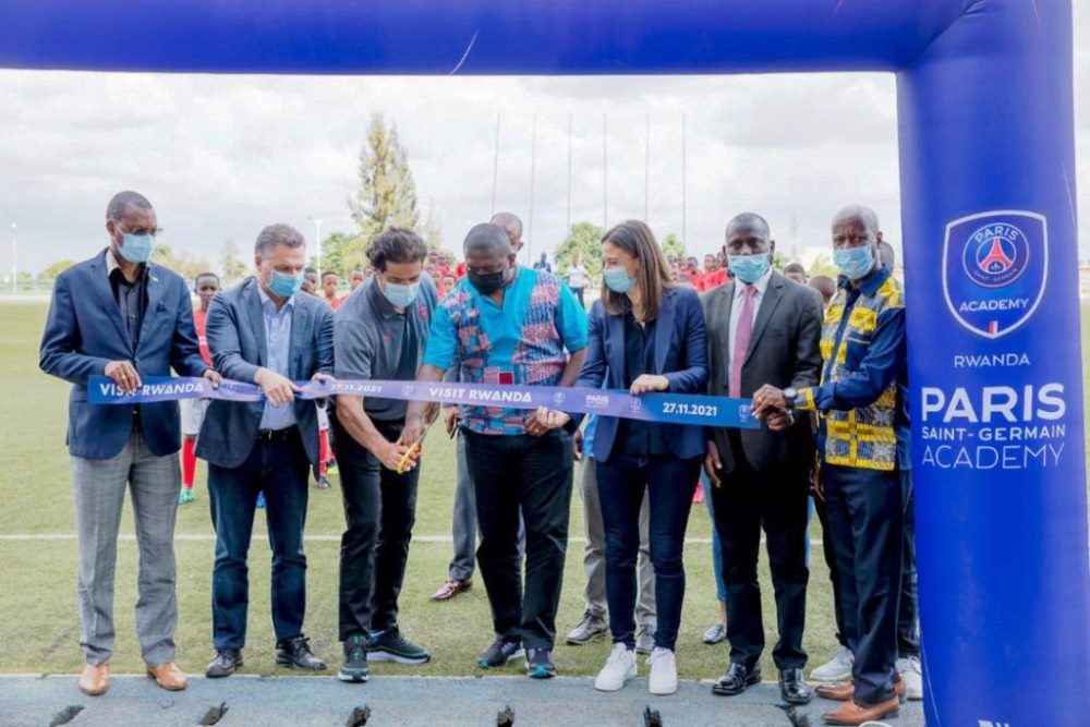 Officials cutting a ribbon at the launch of Paris Saint Germain Academy in Rwanda. 