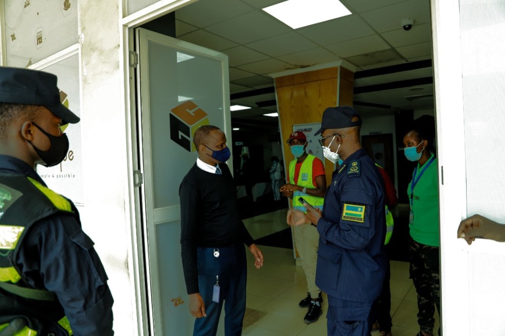ACP Reverien Rugwizangoga, the Northern Region Police Commander (RPC) with other Police stakeholders while checking whether traders adhere to Covid-19 directives.