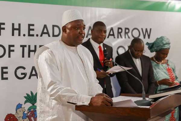 Adama Barrow speaks during his swearing in as president of Gambia at the Gambian embassy in Dakar on January 19, 2017.