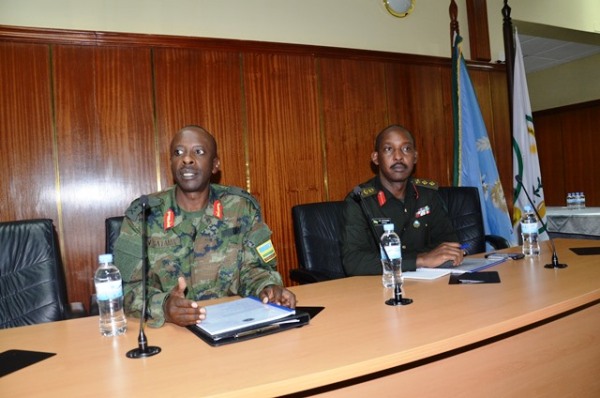 Brig Gen Gatama (left) and Col David Bukenya briefing Rwandan Contingent at RDF Headquarters