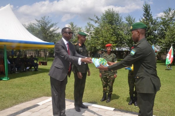 Maj JP Mutarambirwa (above) and Maj Elias Byamukama (below) receiving their awards