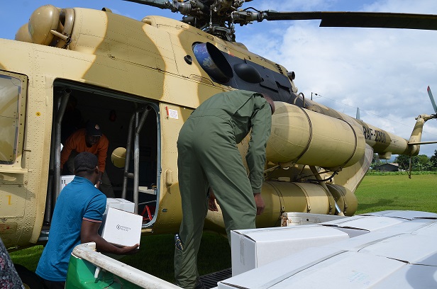 Rwanda is using Pyretrum EWC+ pesticide produced by Sopyrwa, a Ministry of Defence affiliated company to cantain the fall armyworm; it was airlifted to different parts of the country.Photo Minadef