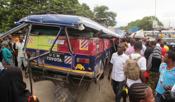 PASSERS-BY look at one of three motor vehicles that got involved in a road accident which occurred at Matumbi area along Nelson Mandela Expressway in Dar es Salaam on Wednesday causing several deaths and injuries.