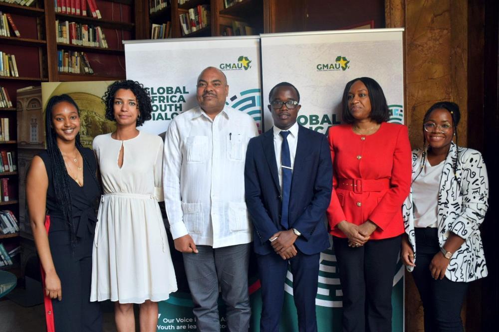 From left : Ms Maya Musenga, Mrs Marta Sachy, Amb. Mahmoud Thabit Kombo, Mr Humuza Gisa Roick, Mrs Gwendy Omijeh and Ms Ada ugo Abara in a group photo after attending the event.