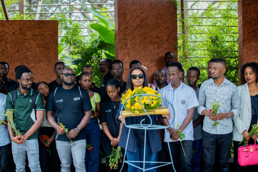 The ALX Rwanda boss, Uwurugwiro Nimie Chaylone, lays a wreath at the mass graves where victims of the Genocide against the Tutsi are buried at the Kigali Genocide Memorial in Gisozi.