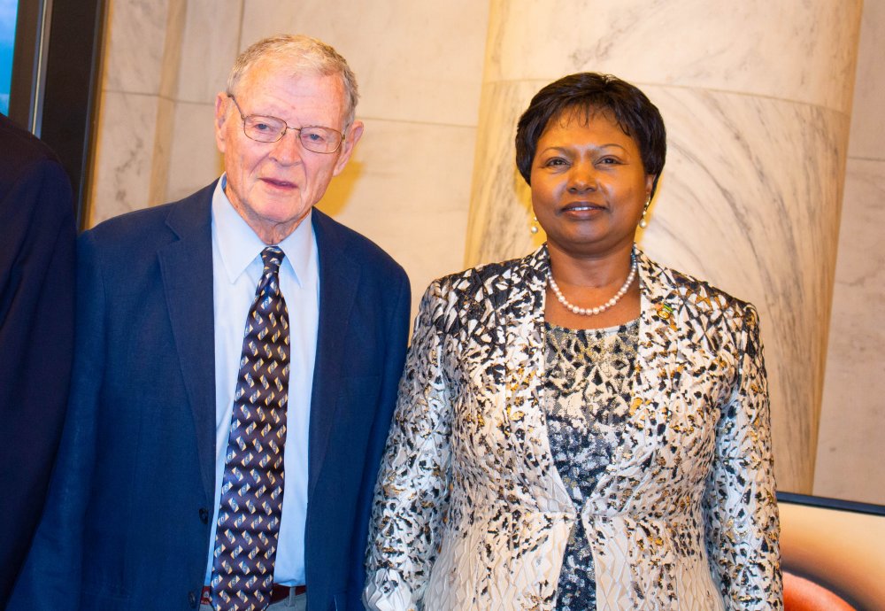 Rwanda's Ambassador to the US, Mathilde Mukantabana posing for a photo with Senator Inhofe. 