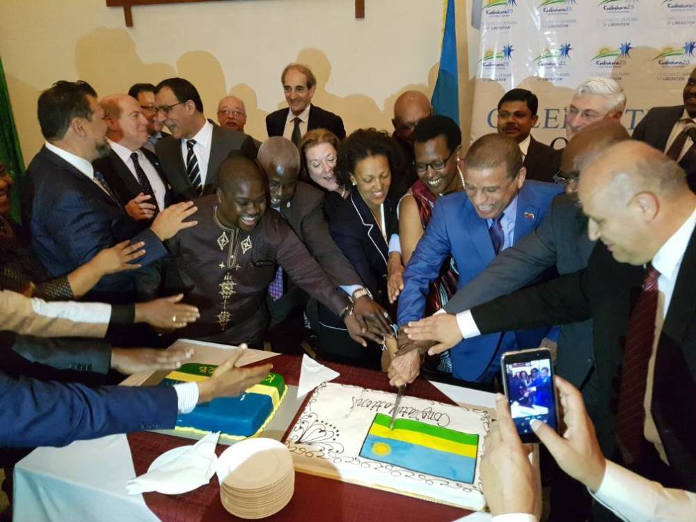 Ambassadors cutting the celebration cake