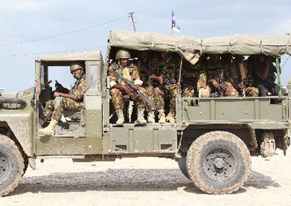 Kenya Defence Forces under Africa Union Mission in Somalia (Amisom) soldiers patrol Afmadow town in Somalia on November 22, 2015. The EU is the main financier of Amisom, committing about €1.2 billion (Sh133.85 billion) since 2007.
