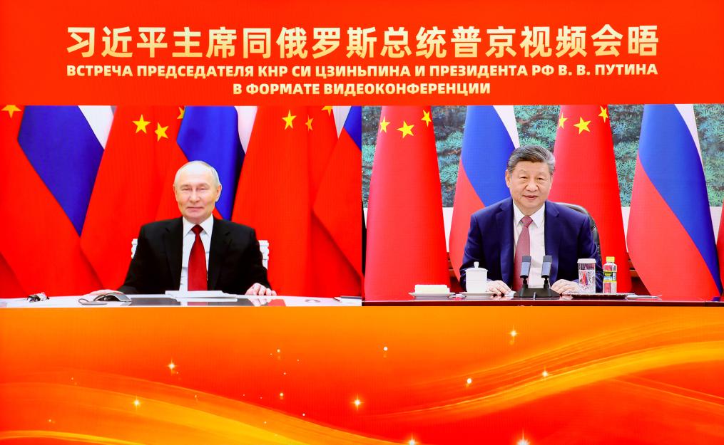 Chinese President Xi Jinping holds a virtual meeting with Russian President Vladimir Putin at the Great Hall of the People in Beijing, capital of China, Feb. 4, 2026.