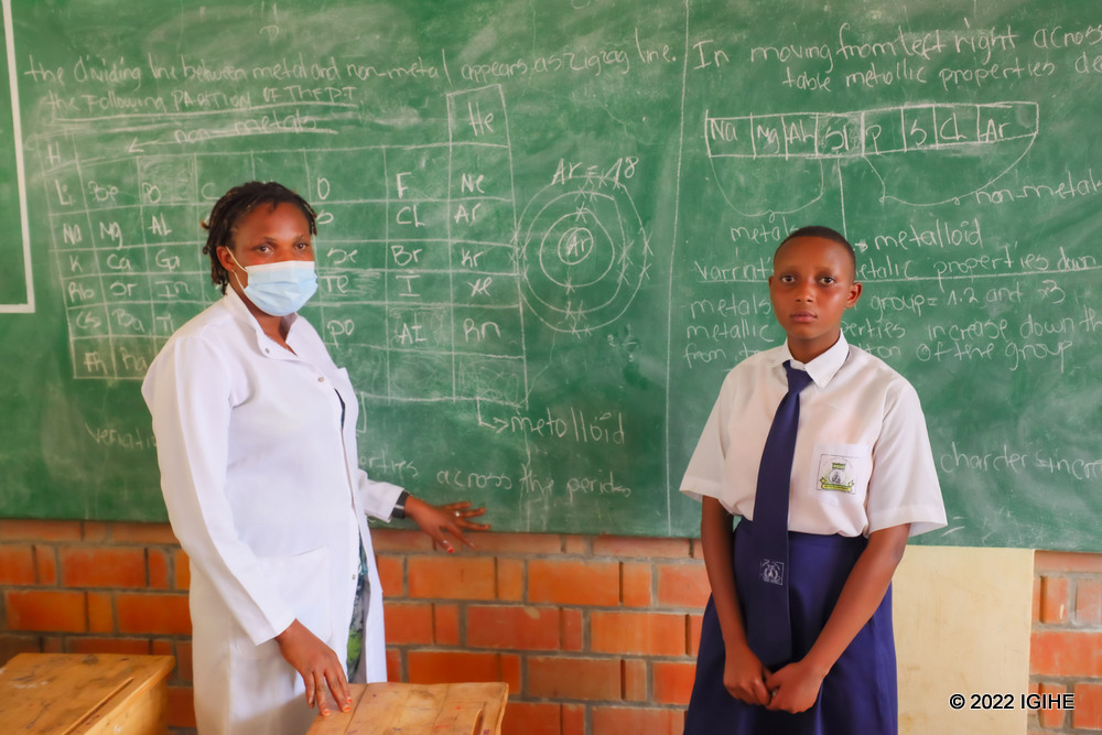 Umuhoza with her teacher in class. 