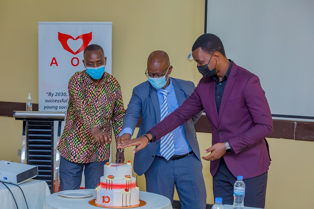 Guests joined founders of the organization for a cutting session during the celebration of 10-year anniversary.   