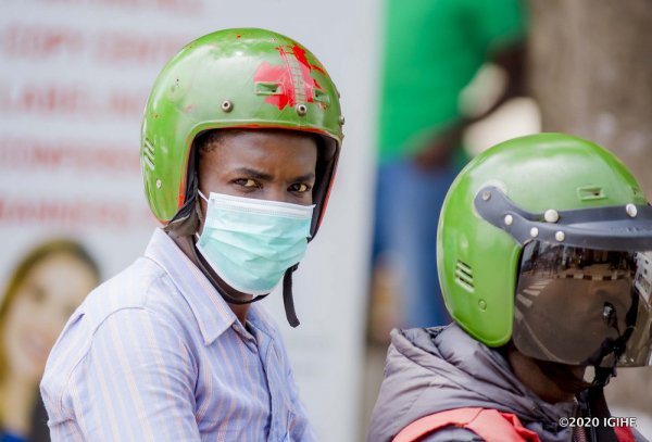 Motorcyclist who carrying a passenger without the mandatory headscarf or without a hand sanitizer or found  will be fined  Rwf25,000 
