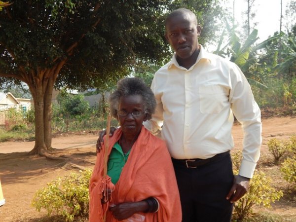 Albert Musabyimana with one of the beneficiaries
