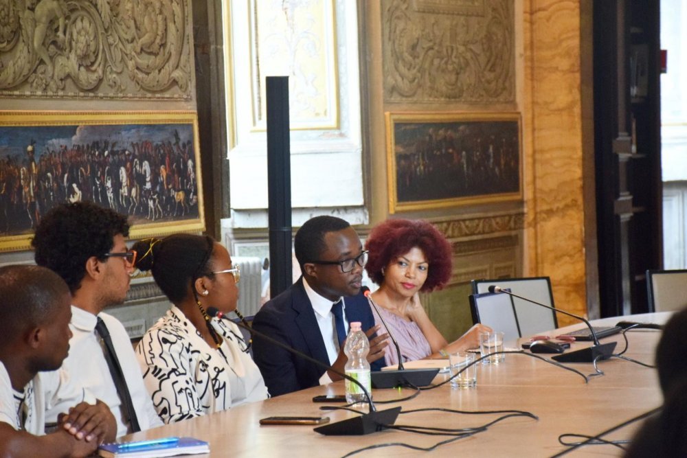 Humuza Gisa Roick, Founder and President of Global Africa Youth Dialogue speaking at the event. 