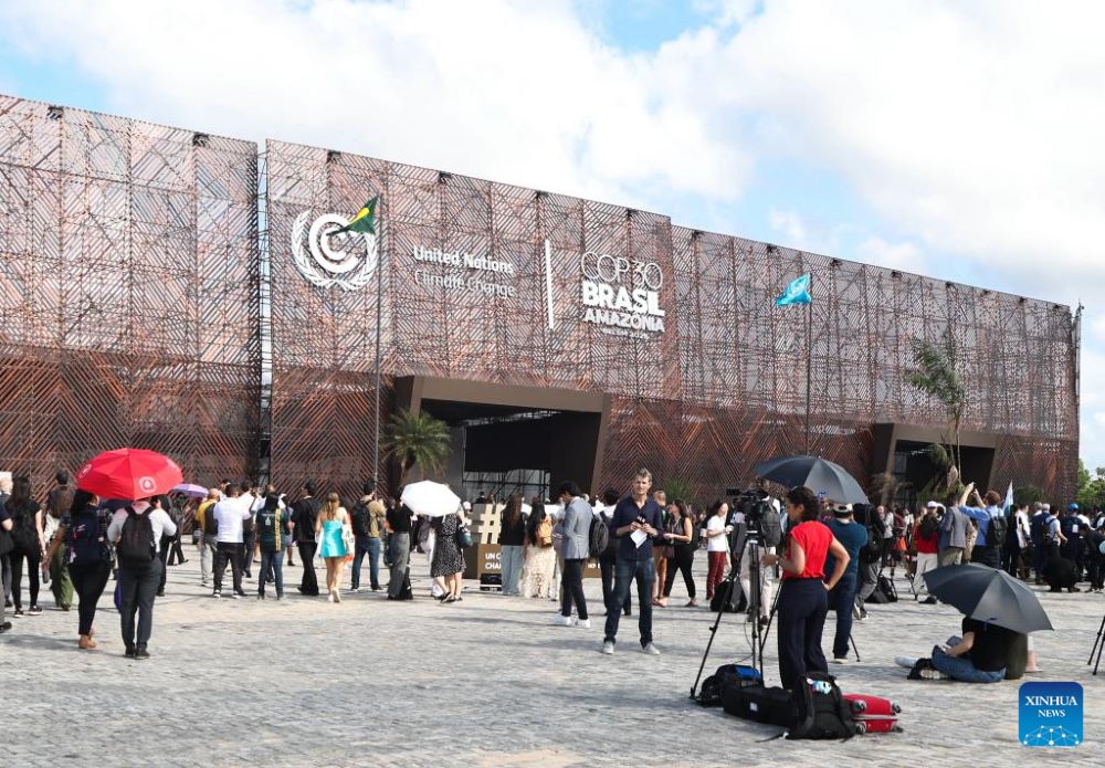 Participants arrive at the venue of the 30th United Nations climate change conferencein Belem, Brazil, Nov. 10, 2025. The 30th United Nations climate change conference, commonly known as COP30, opened Monday in Belem, in the Brazilian state of Para, with the aim of putting the fight against climate change back in the center of international priorities, according to local authorities.