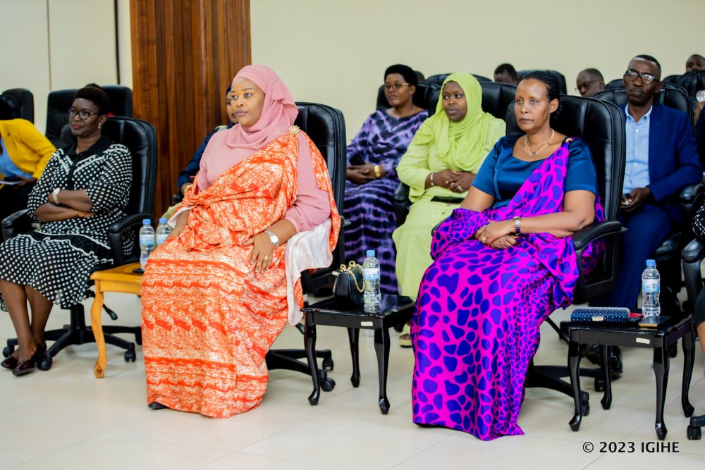 Commissioner Umwari and NEC Chairperson Odda Gasinzigwa after taking oaths.  
