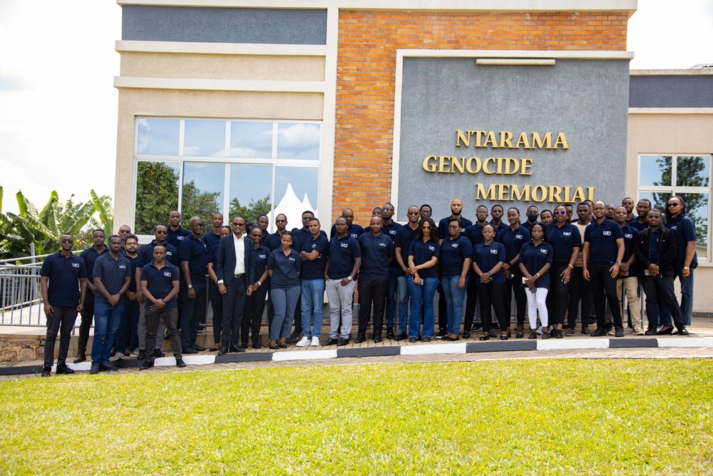 Employees of QT Global Software Ltd at Ntarama Memorial where over 6,000 victims of the 1994 Genocide against the Tutsi are laid to rest. 