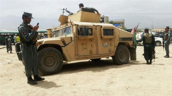 Afghan troops secure the site of Thursday's attack