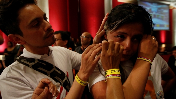 A 'yes' supporter cries after hearing the referendum results