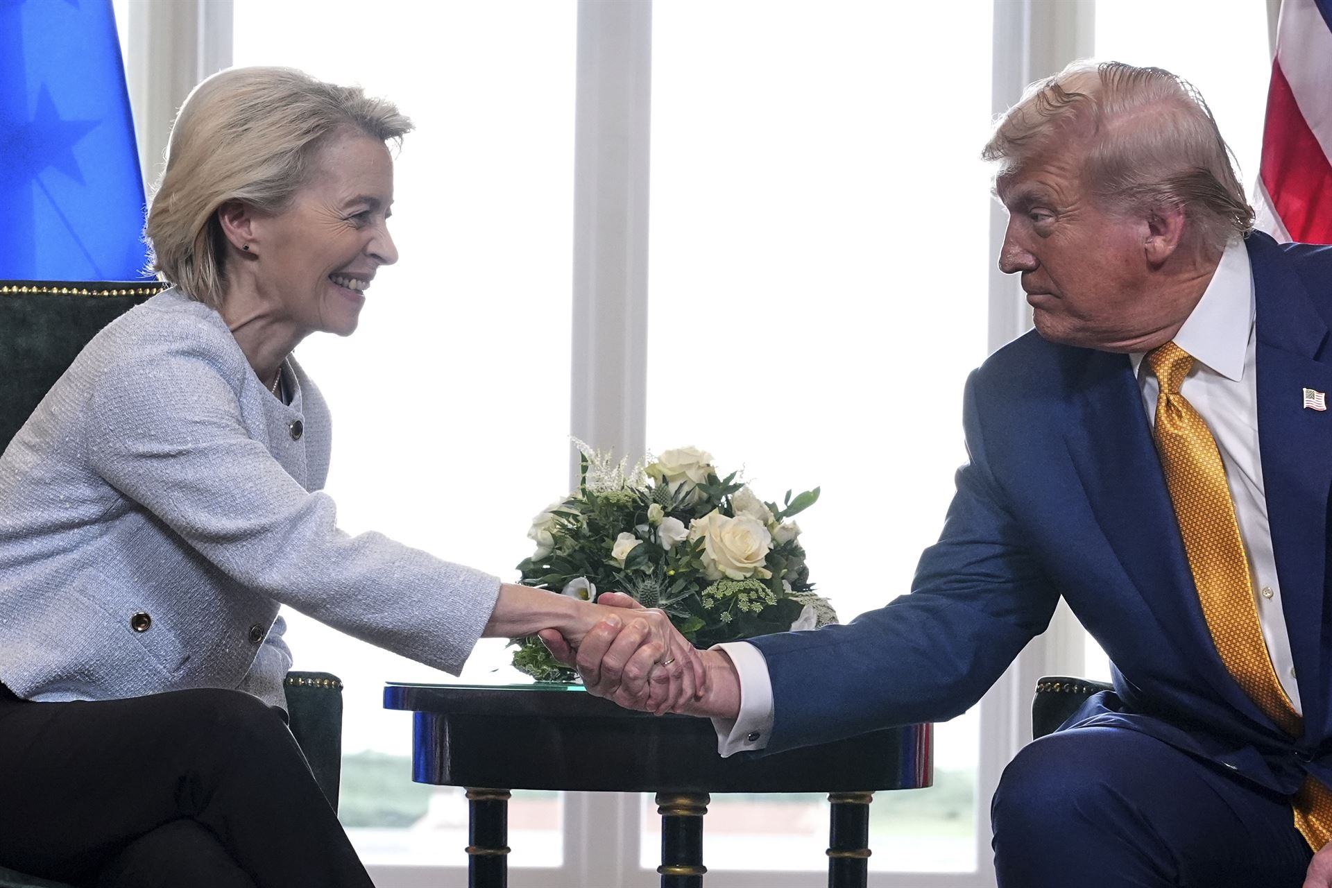 President Donald Trump and European Commission President Ursula von der Leyen shake hands after reaching a trade deal at the Trump Turnberry golf course in Turnberry, Scotland, July 27, 2025. 