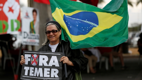 Rousseff was greeted by cheering supporters as she arrived at the Senate