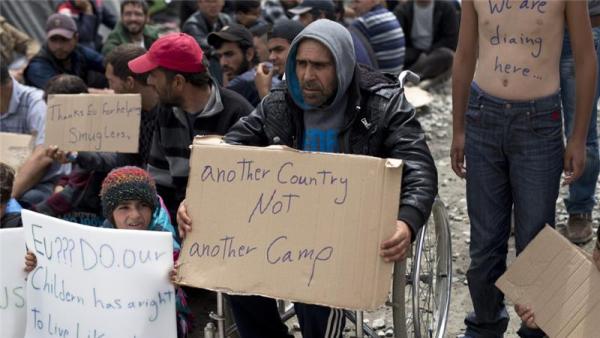 About 54,000 refugees are stranded in Greece, as the EU and Turkey work on a deal designed to stem their flow into Europe