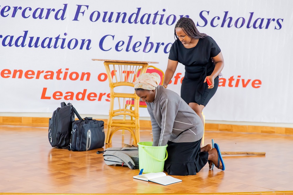 Graduates acting out their journey at respective universities.