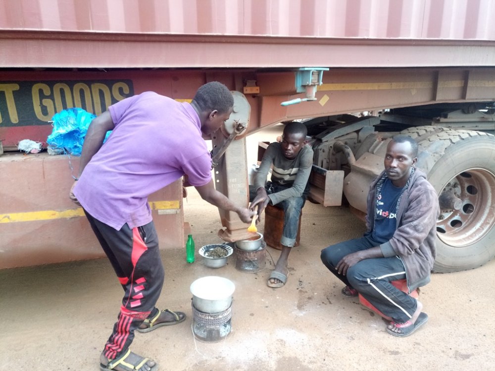 You will find them putting saucepans on stoves in their parkings. They eat their food beneath the parked lorries, pray God from there and keep all their stuffs there.