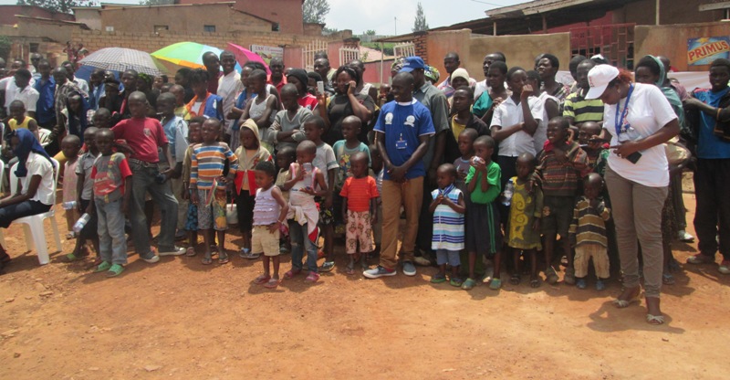 Kinyinya residents hearing officials' advices as they wait for the distribution of condoms