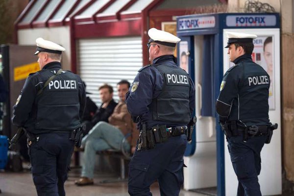 Police officers patrol a Brussels street on Friday. Kenyans should worry about the emerging tactics used by terrorists.