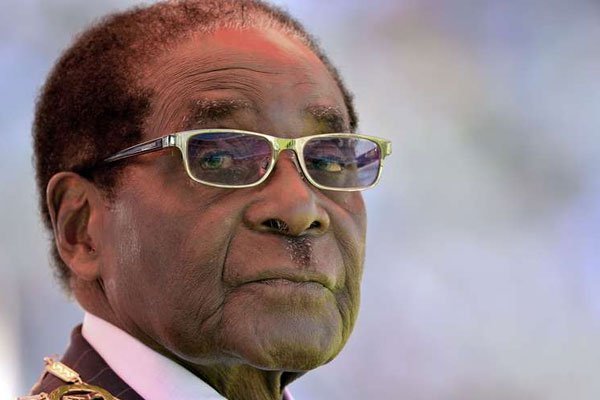 Zimbabwean President Robert Mugabe looks on during his inauguration and swearing-in ceremony on August 22, 2013.