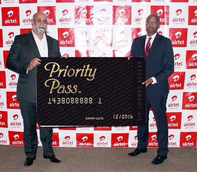 Bhullar and Nyirubutama unveil the priority pass card to customers