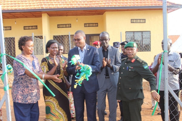 Officials and beneficiaries during the handover of houses yesterday 