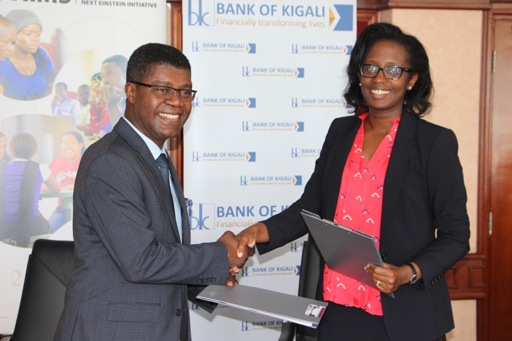 Thierry Zomahoun, President and CEO of AIMS and Dr. Diane Karusisi, Bank of Kigali Chief Executive Officer