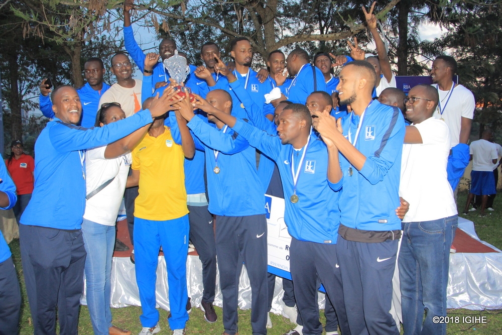 Bank of Kigali receiving a Trophy cup