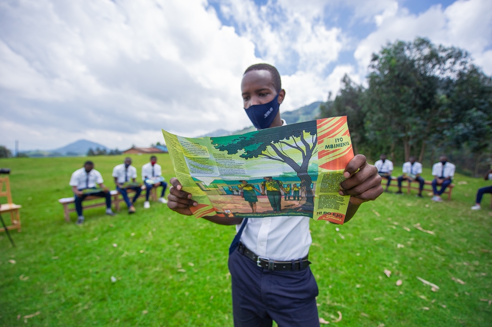 Distribution of leaflets targeting boys at Groupe Scolaire Buhuga.