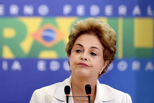 Brazilian President Dilma Rousseff gestures during the Education in Defense of Democracy event, at the Planalto Palace in Brasilia, on April 12, 2016.