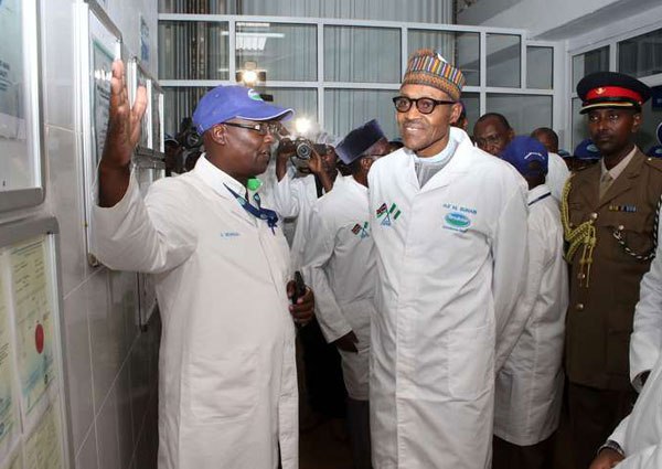 Nigeria President Muhammadu Buhari is taken on a tour of Brookside Dairy Limited in Ruiri on January 28, 2016. The company has acquired a 51 per cent stake in Inyange Industries of Rwanda.