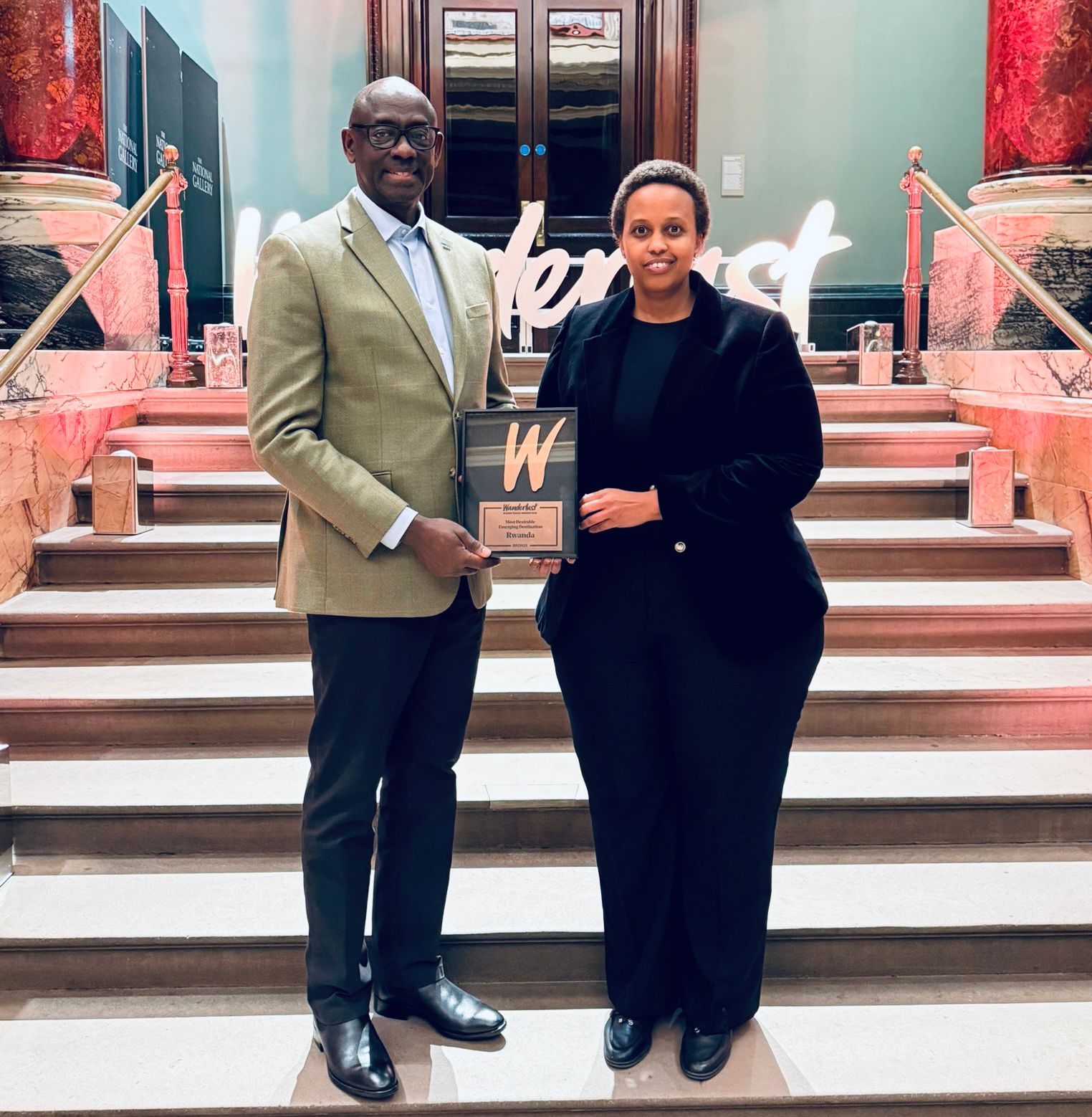 High Commissioner Busingye Johnson, Rwanda’s Ambassador to the United Kingdom, and Kageruka Ariella, Head of the Tourism Department at the Rwanda Development Board (RDB), were delighted to receive the bronze medal in the “Most Desirable Emerging Destination” category at the Wanderlust Travel Awards 2025.