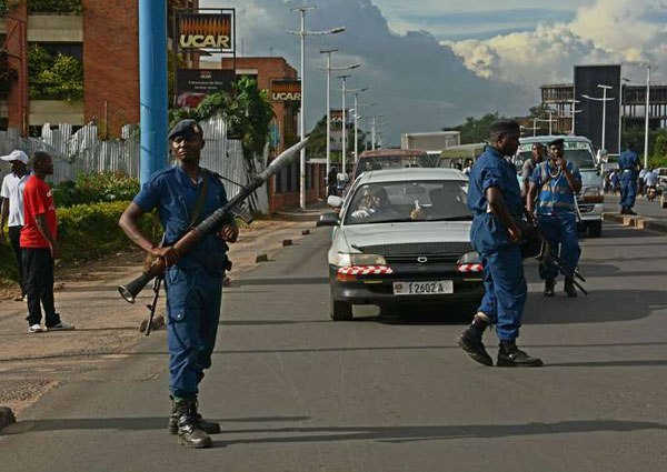 Heavily armed police patrol the streets in Bujumbura on April 12, 2016. Hundreds have been killed and a quarter of a million people have fled Burundi since President Pierre Nkurunziza’s controversial decision April 2015 to run for a third term, a vote he won amid opposition boycotts in July.