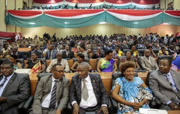 In this Thursday, Aug. 20, 2015 file photo, members of Burundi's Parliament prepare for the swearing-in ceremony of President Pierre Nkurunziza, in the parliament building in Bujumbura, Burundi.