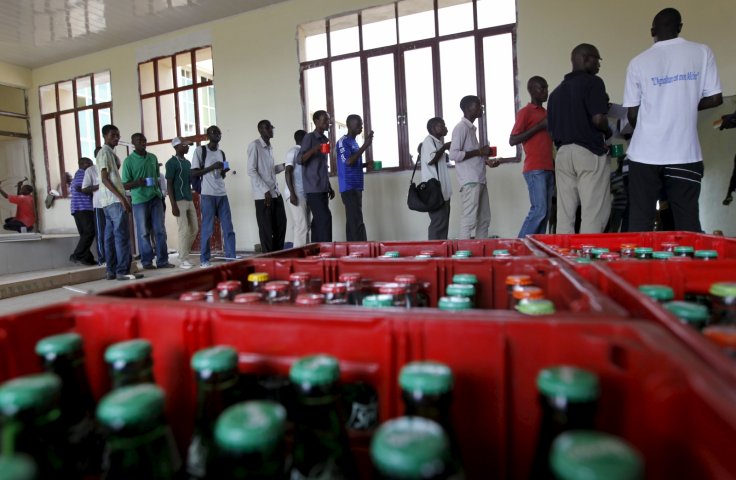 Students from a Burundi university queue to receive food rations as they camp outside the US embassy in the capital Bujumbura. Burundi is the world's poorest country, according to the International Monetary Fund