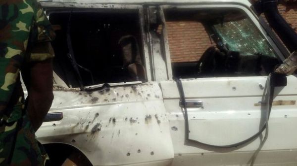 attacked car Image caption Gen Athanase Kararuza was attacked by heavily armed men while he was driving