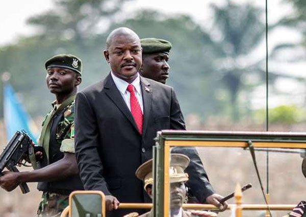 Burundi's President Pierre Nkurunziza arrives for celebrations of the country's 53rd Independence Anniversary on July 1, 2015 at Prince Rwagasore Stadium in Bujumbura. Foreign NGOs face tough working conditions.