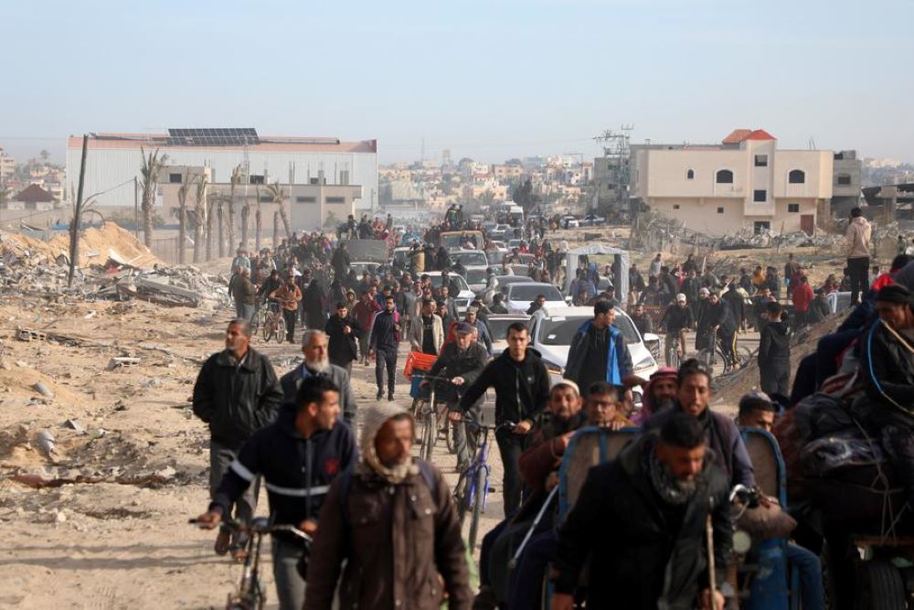 Palestinians return to the southern Gaza Strip city of Rafah on Jan. 19, 2025. The Israel-Hamas ceasefire agreement in Gaza came into effect on Sunday, after more than 15 months of deadly fighting. (Photo by Rizek Abdeljawad/Xinhua)