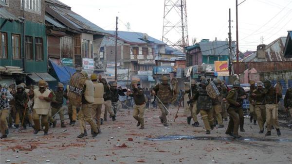 The troops fired tear gas and pellet guns to disperse the swelling crowd, police said